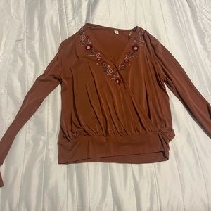 Burnt orange blouse